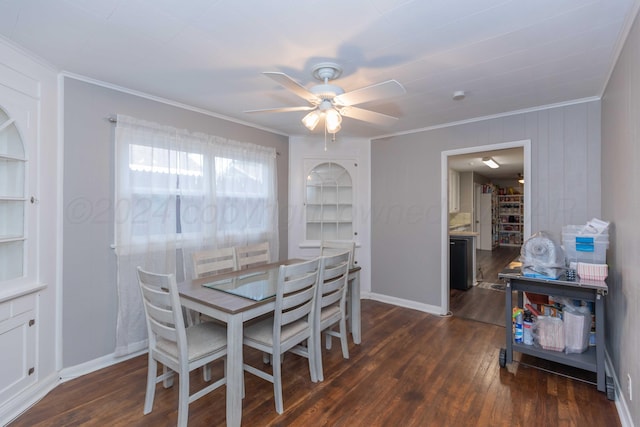 dining room featuring ceiling fan, dark hardwood / wood-style flooring, and ornamental molding