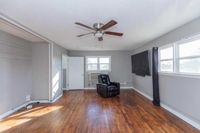 unfurnished room with dark hardwood / wood-style flooring and ceiling fan