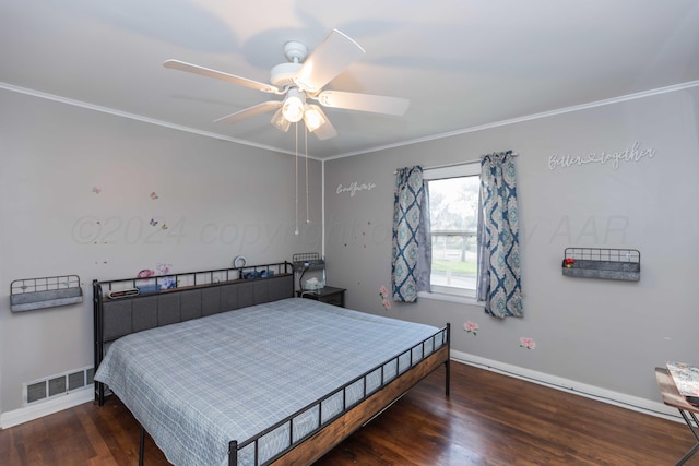 bedroom featuring ornamental molding, dark hardwood / wood-style flooring, and ceiling fan