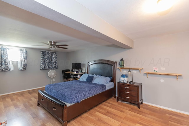 bedroom with light wood-type flooring and ceiling fan