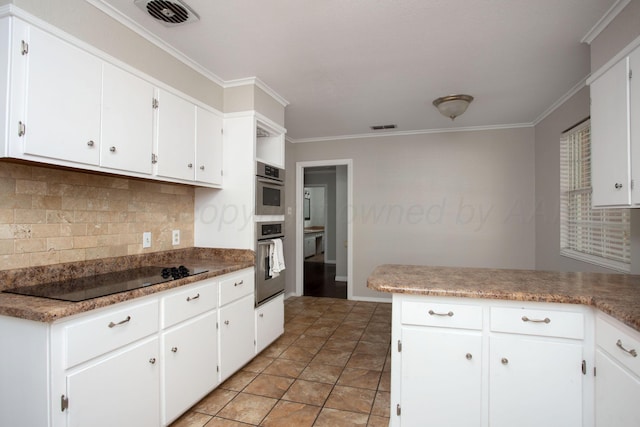 3203 S Austin St, Amarillo, TX 79109 - kitchen with black electric cooktop, tasteful backsplash, stainless steel oven, ornamental molding, and white cabinetry