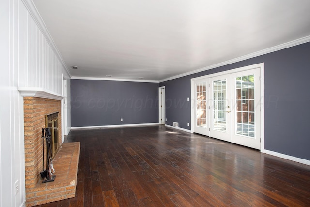 3203 S Austin St, Amarillo, TX 79109 - unfurnished living room with wood finished floors, ornamental molding, french doors, and a fireplace