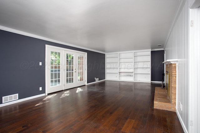 3203 S Austin St, Amarillo, TX 79109 - unfurnished living room featuring dark wood finished floors, crown molding, a fireplace, and built in features