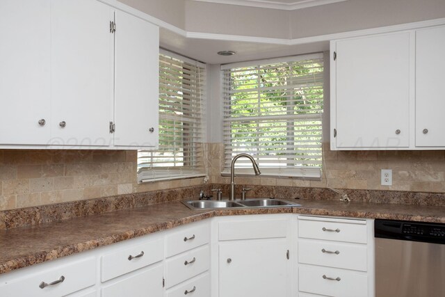 3203 S Austin St, Amarillo, TX 79109 - kitchen with dishwasher, white cabinets, and backsplash