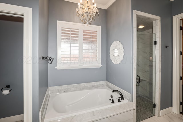 6817 Baccus Dr, Amarillo, TX 79124 - full bathroom with a shower stall, a garden tub, a chandelier, and crown molding