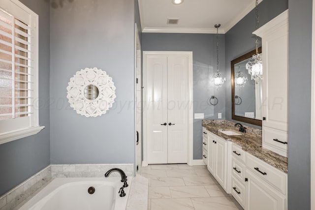 6817 Baccus Dr, Amarillo, TX 79124 - bathroom featuring crown molding, vanity, a bath, and marble finish floors