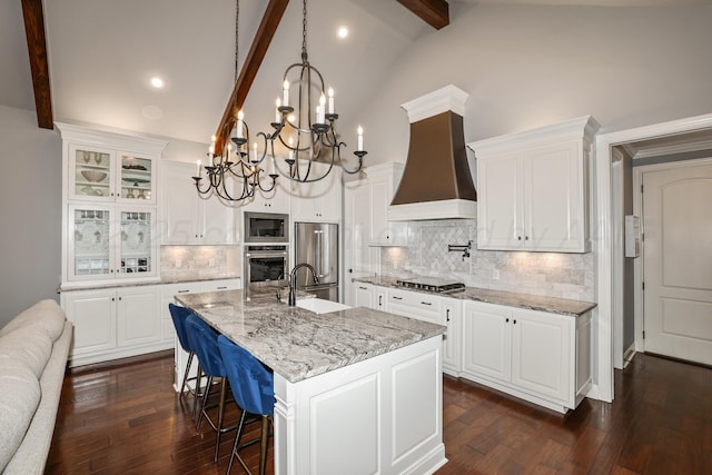 6817 Baccus Dr, Amarillo, TX 79124 - kitchen featuring stainless steel appliances, a chandelier, beam ceiling, a sink, and custom exhaust hood