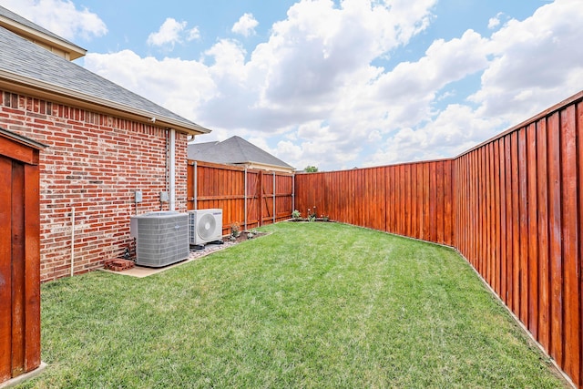 6817 Baccus Dr, Amarillo, TX 79124 - view of yard featuring central air condition unit and ac unit