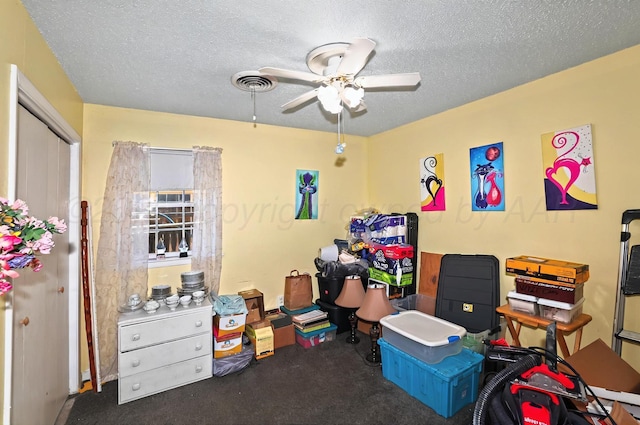 6005 Gainsborough Rd, Amarillo, TX 79106 - game room with ceiling fan, carpet, and a textured ceiling