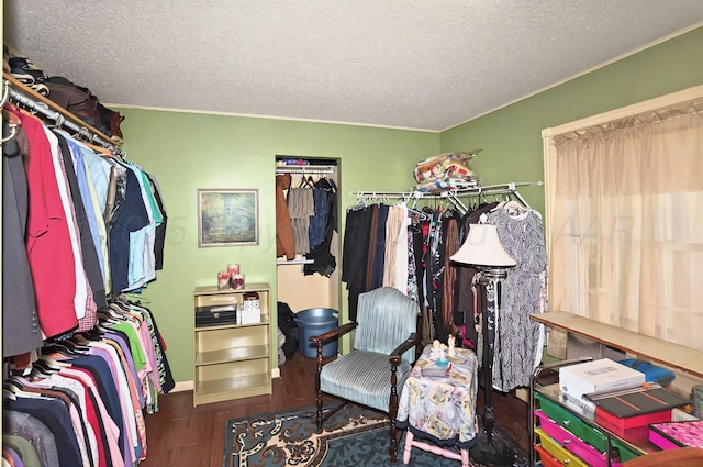 6005 Gainsborough Rd, Amarillo, TX 79106 - walk in closet featuring wood finished floors