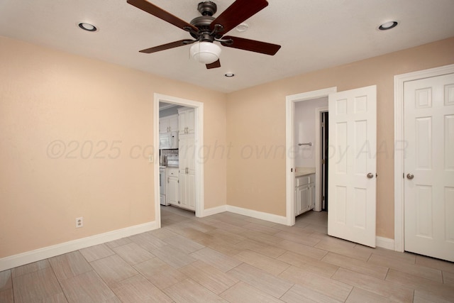 3925 Gatewood St, Amarillo, TX 79109 - unfurnished bedroom with recessed lighting, wood tiled floor, and baseboards
