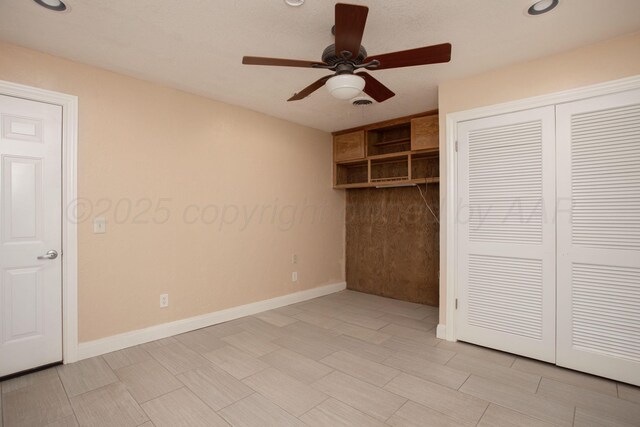 3925 Gatewood St, Amarillo, TX 79109 - unfurnished bedroom with a ceiling fan, baseboards, and a closet