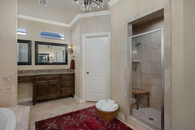 7908 London Ct, Amarillo, TX 79119 - bathroom with visible vents, a shower stall, tile patterned flooring, vanity, and crown molding