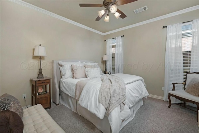 7908 London Ct, Amarillo, TX 79119 - bedroom featuring visible vents, baseboards, ornamental molding, and light carpet