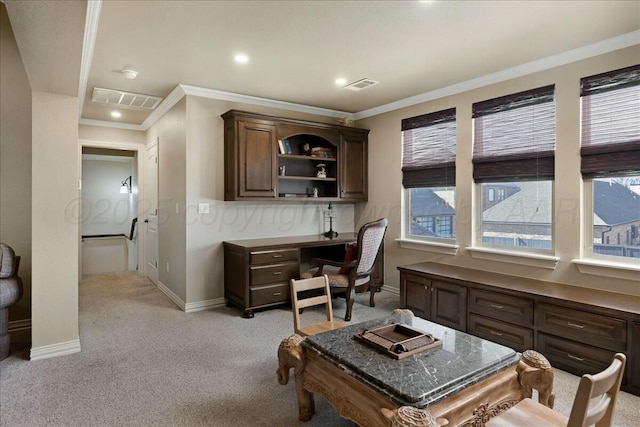 7908 London Ct, Amarillo, TX 79119 - home office with light colored carpet, crown molding, baseboards, and visible vents