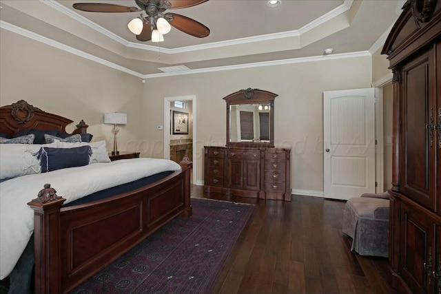 7908 London Ct, Amarillo, TX 79119 - bedroom with a tray ceiling, crown molding, dark wood-type flooring, and baseboards