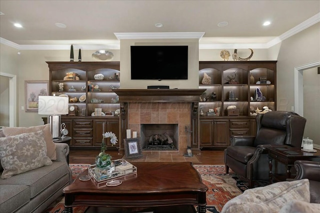 7908 London Ct, Amarillo, TX 79119 - living room featuring dark wood-style flooring, a fireplace, and crown molding