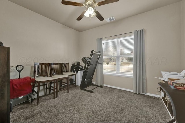 workout area with ceiling fan, baseboards, visible vents, and dark carpet