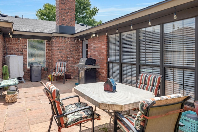 6410 Hamstead Dr, Amarillo, TX 79109 - view of patio with a grill and outdoor dining space