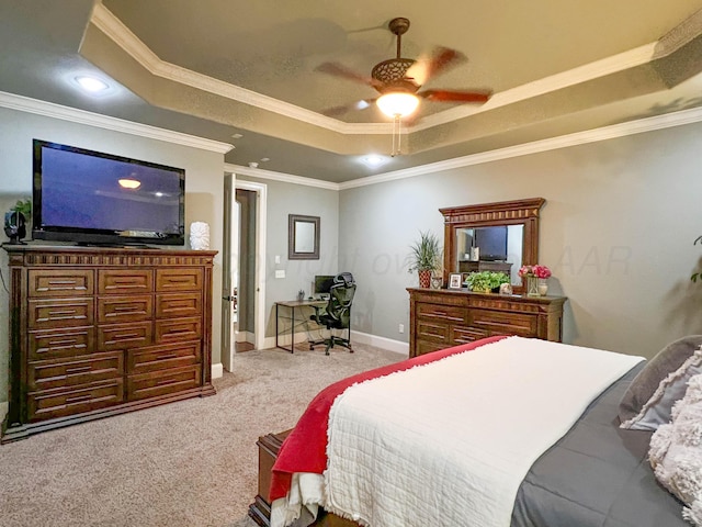 7507 Continental Pkwy, Amarillo, TX 79119 - bedroom featuring a raised ceiling, light carpet, crown molding, ceiling fan, and an office area