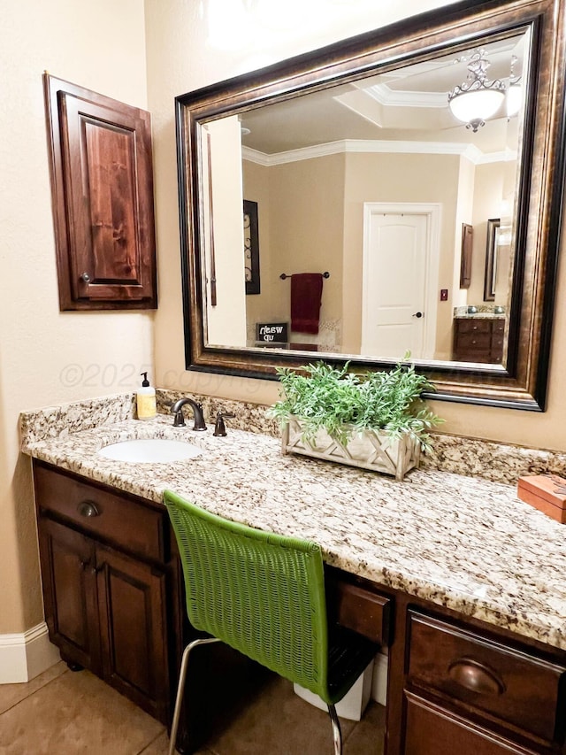 7507 Continental Pkwy, Amarillo, TX 79119 - bathroom with vanity, ornamental molding, a raised ceiling, and tile patterned flooring