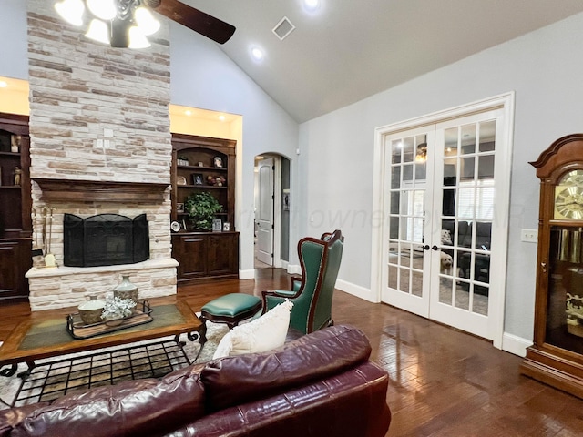 7507 Continental Pkwy, Amarillo, TX 79119 - living room with french doors, ceiling fan, wood finished floors, high vaulted ceiling, and a fireplace