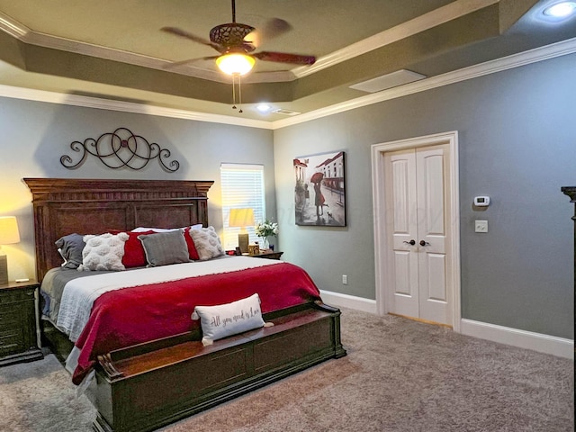 7507 Continental Pkwy, Amarillo, TX 79119 - bedroom with ornamental molding, a tray ceiling, carpet floors, and a ceiling fan