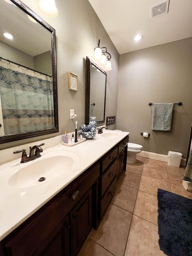 7507 Continental Pkwy, Amarillo, TX 79119 - bathroom with tile patterned floors and double vanity