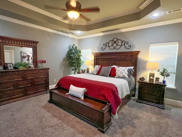 7507 Continental Pkwy, Amarillo, TX 79119 - bedroom with a raised ceiling, carpet, crown molding, multiple windows, and a ceiling fan