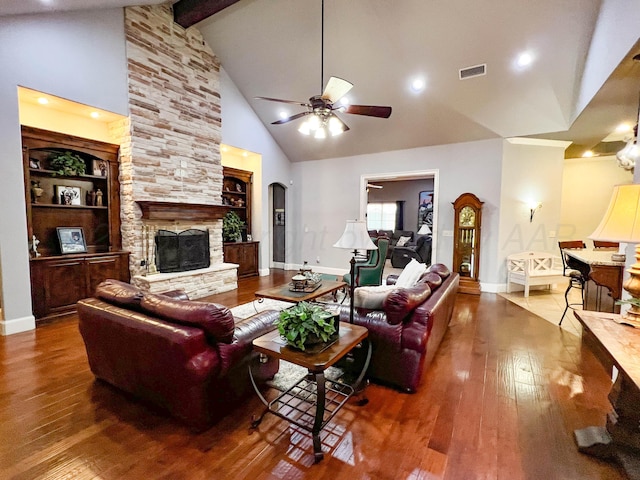 7507 Continental Pkwy, Amarillo, TX 79119 - living area with a ceiling fan, high vaulted ceiling, hardwood / wood-style flooring, a fireplace, and beamed ceiling