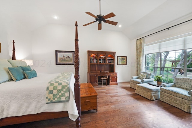 bedroom with dark wood-type flooring, ceiling fan, and vaulted ceiling