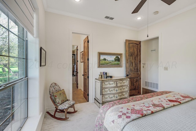 bedroom featuring ornamental molding and ceiling fan