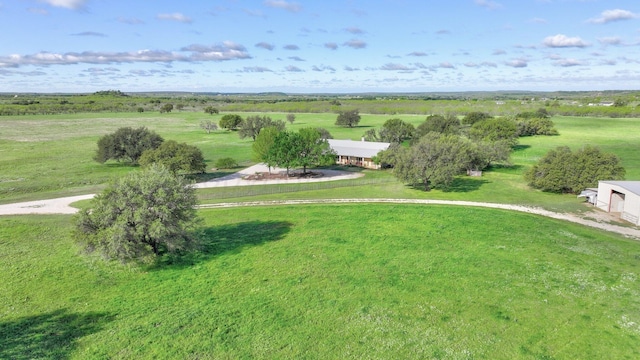 birds eye view of property featuring a rural view