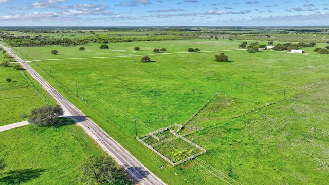 birds eye view of property featuring a rural view