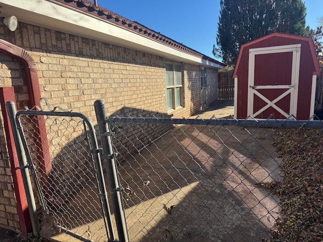 3717 Farwell Dr, Amarillo, TX 79109 - view of property exterior with a gate and brick siding