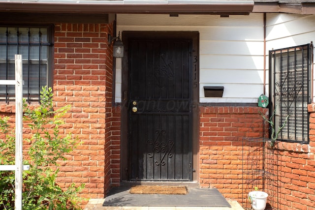 3115 Palm St, Amarillo, TX 79107 - property entrance with brick siding