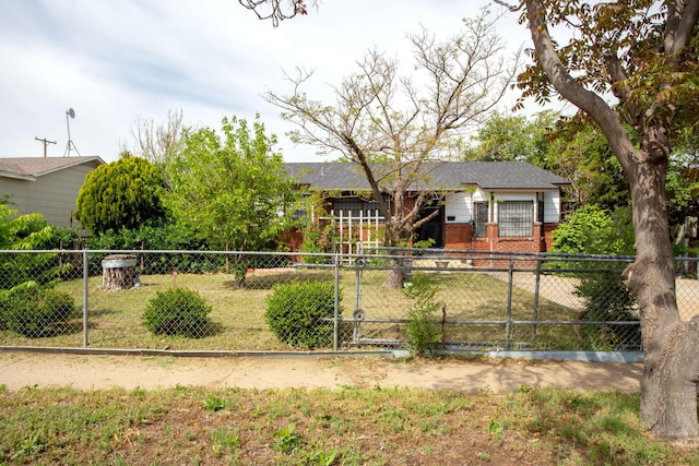 3115 Palm St, Amarillo, TX 79107 - single story home featuring brick siding and a fenced front yard