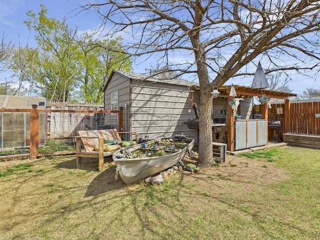 view of yard with a fenced backyard