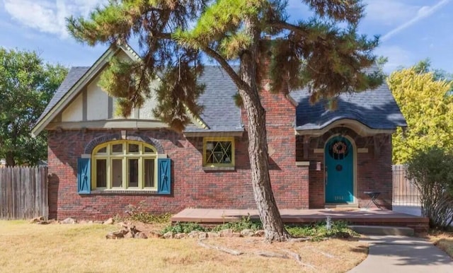 2404 S Harrison St, Amarillo, TX 79109 - tudor home featuring brick siding and fence