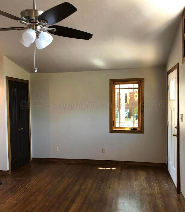 2404 S Harrison St, Amarillo, TX 79109 - unfurnished room featuring hardwood / wood-style flooring, baseboards, lofted ceiling, and ceiling fan