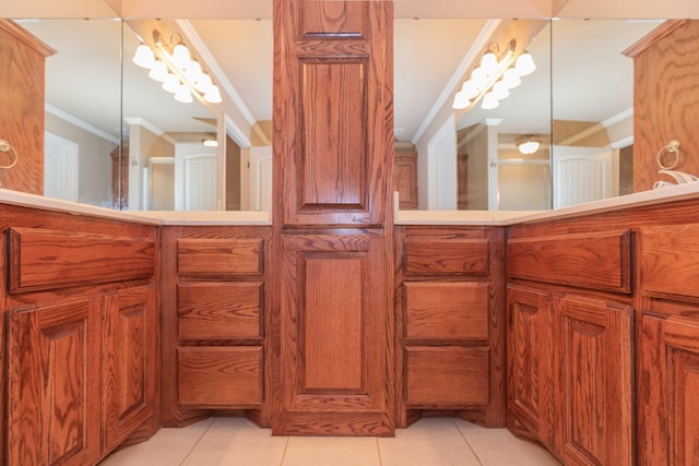 6701 Mosley St, Amarillo, TX 79119 - bathroom with crown molding and tile patterned flooring