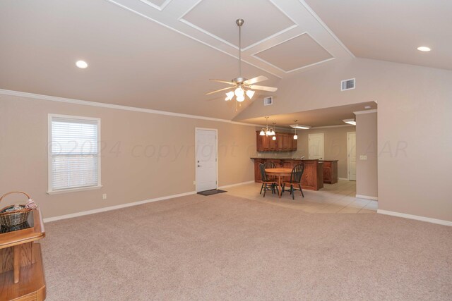 6701 Mosley St, Amarillo, TX 79119 - living area featuring a ceiling fan, light carpet, vaulted ceiling, baseboards, and ornamental molding