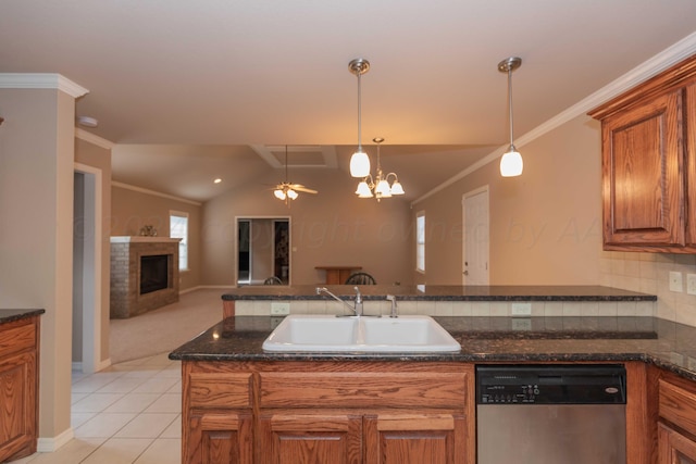 6701 Mosley St, Amarillo, TX 79119 - kitchen featuring dishwasher, a sink, brown cabinets, ornamental molding, and hanging light fixtures
