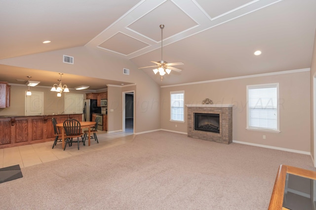 6701 Mosley St, Amarillo, TX 79119 - living room with light colored carpet, a brick fireplace, baseboards, a ceiling fan, and lofted ceiling