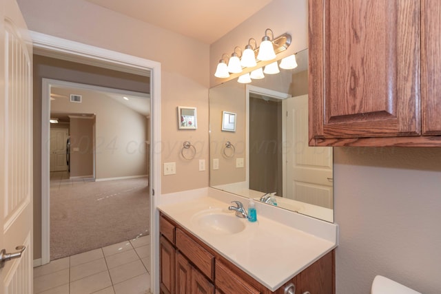 6701 Mosley St, Amarillo, TX 79119 - bathroom featuring tile patterned floors and vanity