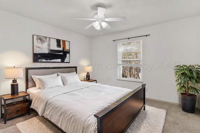 bedroom featuring light carpet and ceiling fan