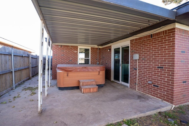 view of patio featuring a hot tub