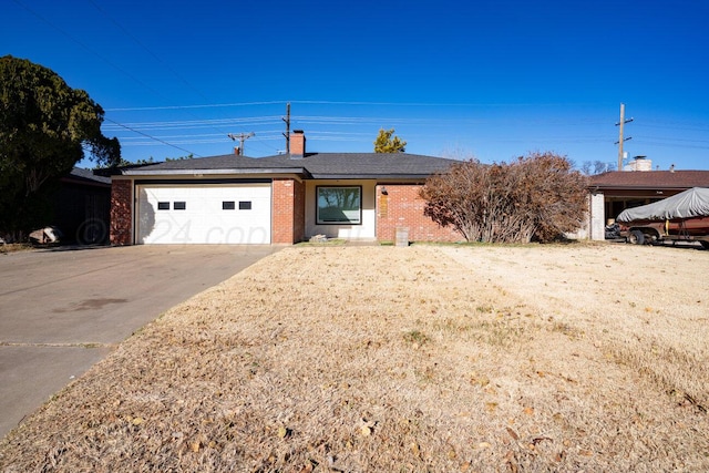 single story home with a garage