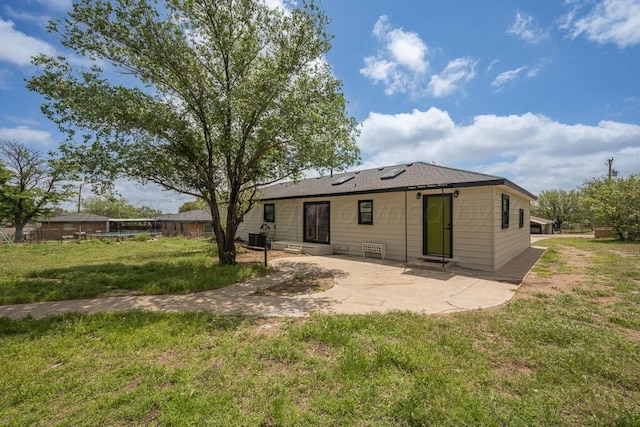 912 W Bonita Ave, Amarillo, TX 79108 - back of house with a lawn, a patio, cooling unit, and entry steps