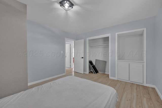 912 W Bonita Ave, Amarillo, TX 79108 - bedroom with a closet, baseboards, and light wood-type flooring